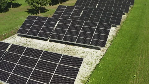 Ground mounted solar panels generate renewable green electricity for business Video stock 346281160