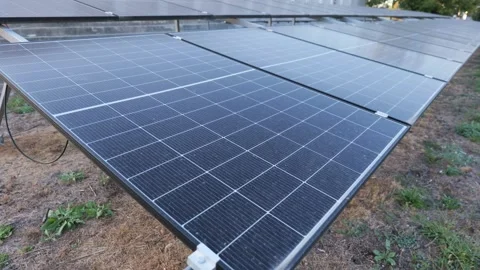 Ground mounted solar panels producing renewable energy Stock Footage 344966522