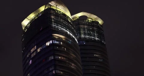 Ground-up night view of high-rise towers along Queens Quay West, Toronto, ON Stock-Footage 327731183