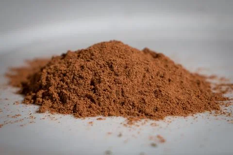 Ground nutmeg in a heap Stock Photos