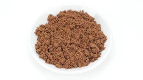 Ground nutmeg spice isolated on white background, rotation. 4K UHD video Stock Footage 155002142