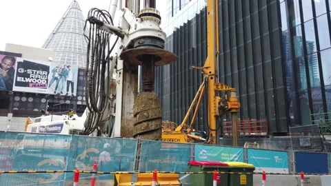 Ground or soil surface foundation machine working Stock Footage 140201754