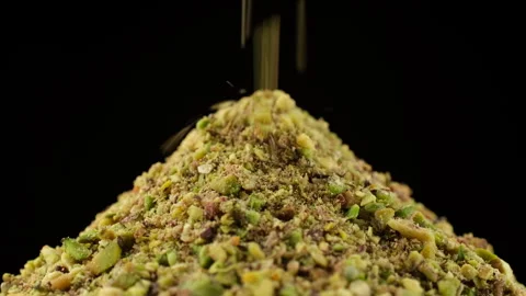 Ground pistachios isolated on black background Stock-Footage 242588789