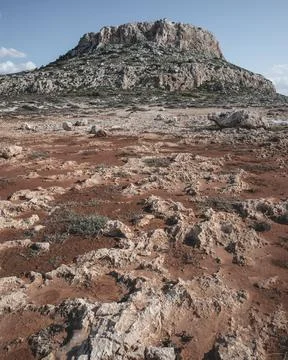 Ground red road to Cape Greco and sea on the background in Ayia Napa Stock-Fotos