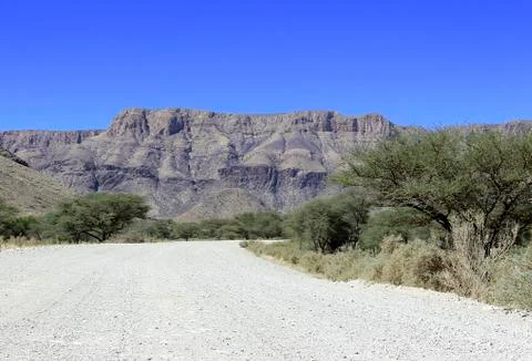 Ground road through the desert Stock Photos