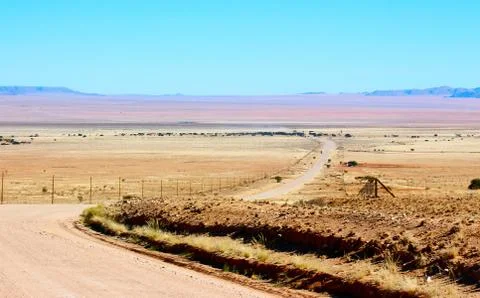 Ground road through the desert Stock Photos