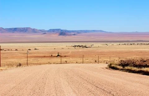 Ground road through the desert Stock Photos