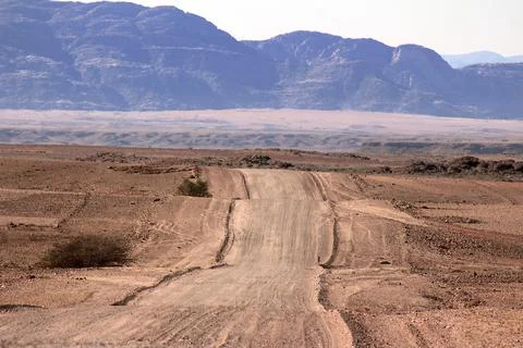 Ground road through the desert Stock Photos