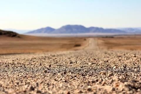 Ground road through the desert Stock Photos