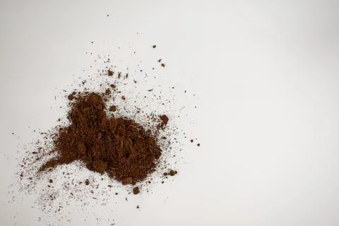 Ground is is scattered on a white background. Isolate. Plant transplant conce Stock Photos