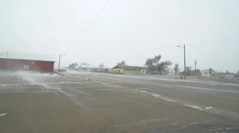 Ground snow blizzard to stop sign on Indian Reservation Stock Footage 40319606