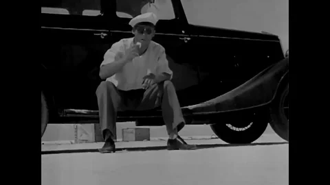 Ground speed records are broken by fast race cars on the salt beds of California Stock Footage 107668323