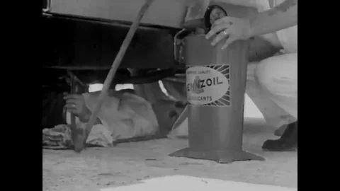 Ground speed records are broken by fast race cars on the salt beds of California Stock Footage 107668522