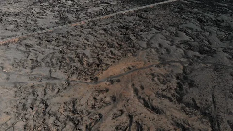 Ground surface coated frozen lava aerial view Stock Footage 104981237