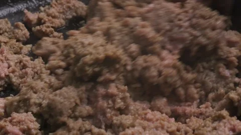 Ground turkey is fried in a frying pan in vegetable oil Stock-Footage 306548592