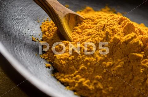 Ground turmeric Stock Photos