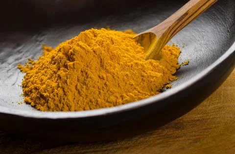 Ground turmeric Stock Photos