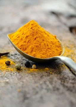 Ground turmeric Stock Photos