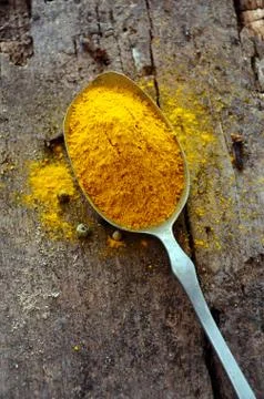 Ground turmeric Stock Photos