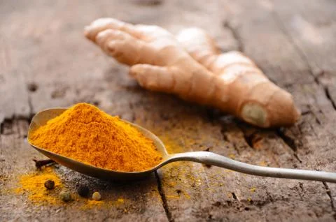 Ground turmeric Stock Photos