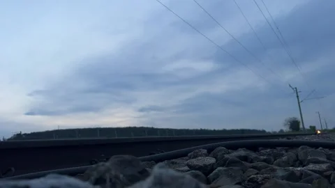 Ground View Of A Passing Train Stock Footage 240436203
