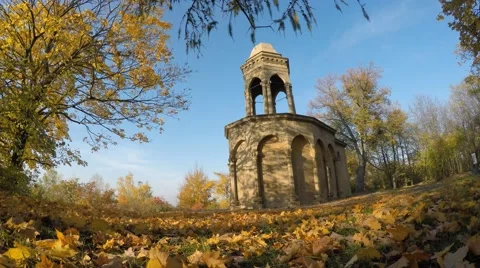 Ground view of sepulcher in forrest during beautiful autumn day with bike family Video stock 56473904