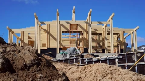Ground works on the construction site of a modern wooden house. Retaining wall. Stock Footage 175200682