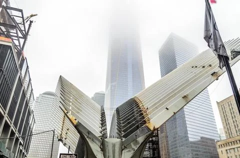 Ground Zero Construction Zone. Freedom Tower in Background on a Foggy Day in NYC Stock Photos