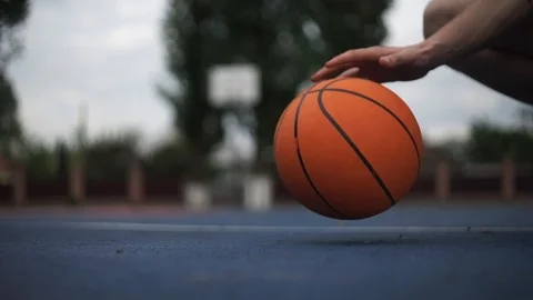 Grounded view of man that practices baseball game outdoors on the field Stock Footage 126915145