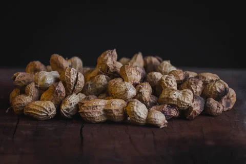 Groundnuts kept on a black background Fotos de archivo