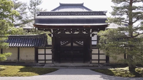 Grounds of Tenryu Ji Buddhist Temple in Kyoto, Japan, tracking gimbal shot Stock Footage