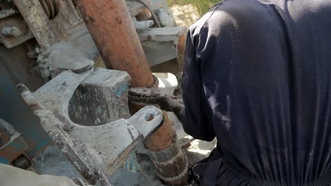Groundwater hole drilling machine installed on the old truck in Lira Uganda . Stock Footage 116404242