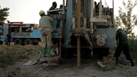 Groundwater hole drilling machine installed on the old truck in Lira Uganda . Stock Footage 116409980