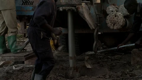 Groundwater hole drilling machine installed on the old truck in Lira Uganda . Stock Footage 116410119
