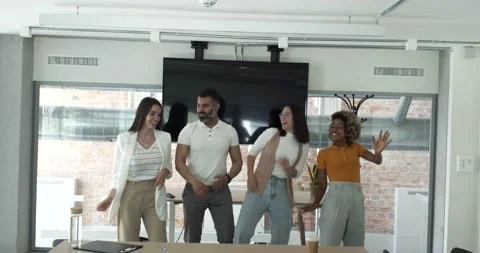 Group of 5 multi-ethnic workers dance in the office. Office party, business Stock Footage 155642563