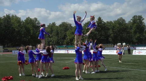 Group Acrobatic Performance Of The Cheerleading Team Video stock 64292933