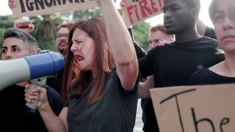 Group of activists people protests for climate change on the street Stock Footage 237894032