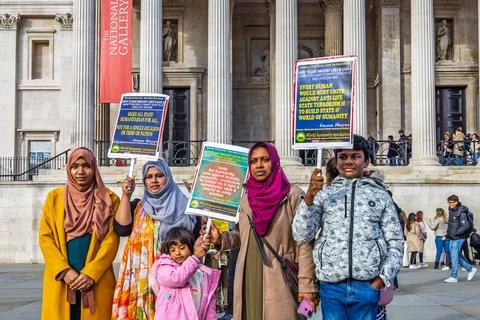 Group of Activists standing with signs in support of a social cause. London,  Stock Photos