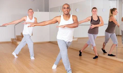 Group of activity people practicing dance techniques Stock Photos