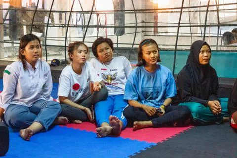 Group Activity Session on Floor Seating Photos