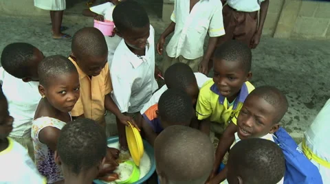 GROUP OF ADEISO STUDENTS WASH DISHES Stock Footage 58070145