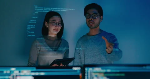Group adult Asia software developers mentor leader manager talk prompt AI bot. Stock Footage 312202668