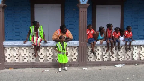 Group of Afro-Caribbean Spectators at Parade on July 14 in Marigot, Saint Martin Stock Footage 108887089