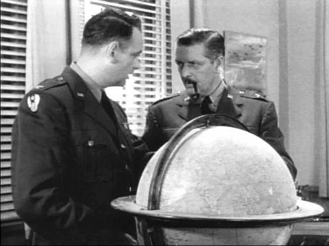 A group of air force officials are seen meeting in 1951 as the narrator Stock Footage 75274252