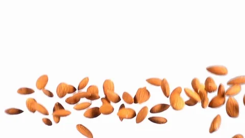 Group of almonds flying in slow motion Stock Footage 118702487