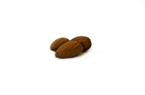 Group of almonds isolated on white Stock Photos