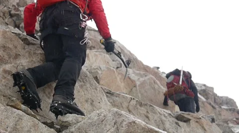 Group of Alpine Climbers Hiking in Mountains Stock Footage 43249167