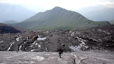 Group of Alpine Climbers walking on glacier Stock Footage 43249014