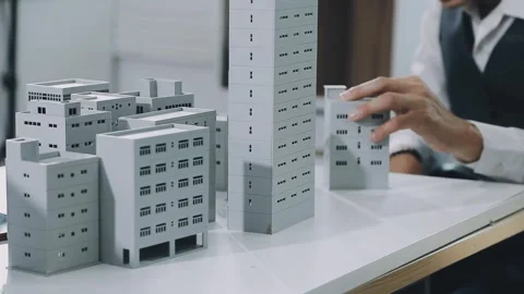 Group of alternative energy engineers discussing a project with a worker du.. Stock Footage 334138179