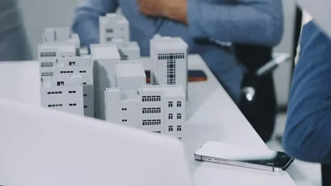 Group of alternative energy engineers discussing a project with a worker du.. Stock Footage 334138192